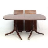 A 20thC mahogany Regency twin pedestal 2 leaf extending dining table 37" wide x 97" long