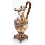 A 19thC silver plate ewer with caned handle The whole 11 3/4" high CONDITION:
