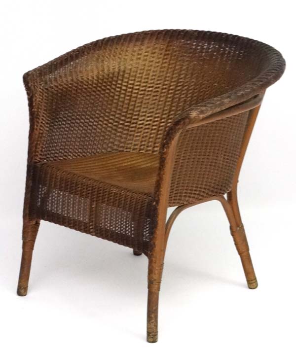 W Lusty & Sons Ltd - A Lloyd Loom armchair. Labelled. - Image 3 of 7
