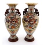 A pair of 20thC Japanese Satsuma style twin handled vases,