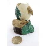 A late 19thC Royal Worcester Majolica Posy Vase, modelled as two mice and an eggshell,