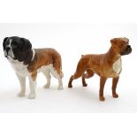 Two Beswick models formed as a Boxer dog in brown tan colour way in gloss finish , number 1202 ,