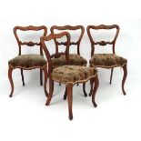 A set of 4 19thC Rosewood French dining chairs with over stuffed seats 31 1/2" high