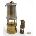 A Welsh Davy lamp marked 'Lamp and Limelite' Company 6 3/4" high together with a miniature model