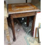 Carved oak occasional table CONDITION: Please Note - we do not make reference to