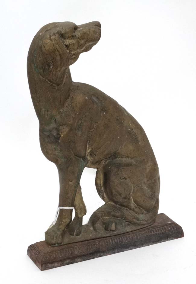 Brass door porter formed as a long dog seageant CONDITION: Please Note - we do not