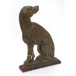 Brass door porter formed as a long dog seageant CONDITION: Please Note - we do not