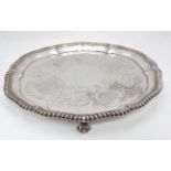A silver plated salver CONDITION: Please Note - we do not make reference to the