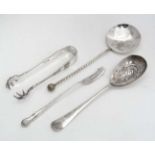 A silver plated pickle fork,