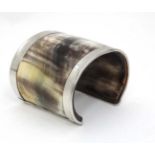 White metal and cow horn bracelet CONDITION: Please Note - we do not make reference