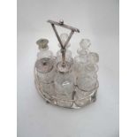 A silver plate 6 bottle cruet stand by HG Long & Co .