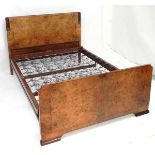 Art Deco : a burr walnut bed with carved decoration to the head board edges, 54" wide.