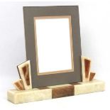 Art Deco: A marble based photograph frame with glass upstand , with bevelled edges ,