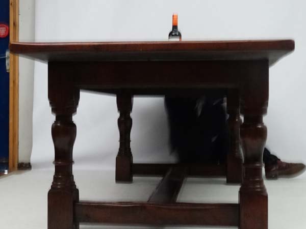 A large oak 4-plank dining table in the 17thC style Refectory table with baluster turned legs and - Image 7 of 7