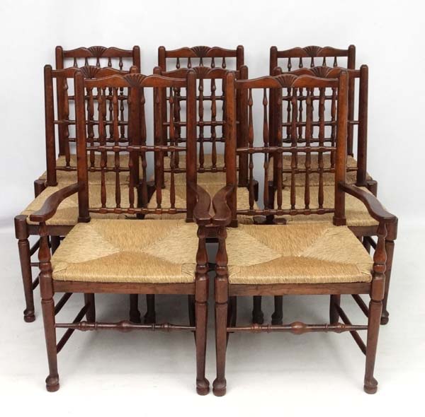 A set of 8 (6+2) oak spindle back chairs with envelope rush seats . - Image 4 of 6