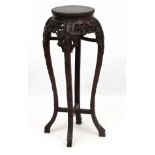 Chinese :A tall Chinese hardwood carved jardiniere stand,