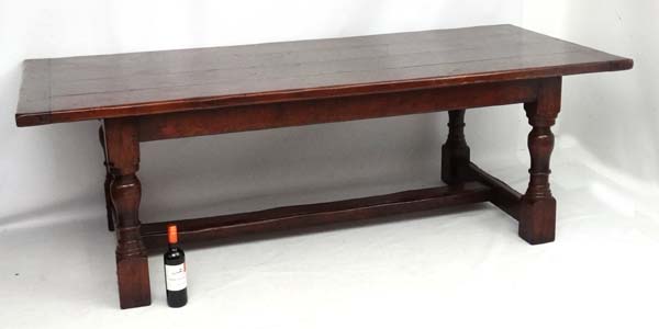 A large oak 4-plank dining table in the 17thC style Refectory table with baluster turned legs and - Image 3 of 7