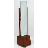 An Art Deco walnut cheval mirror with cupboard under hanging fall front door.