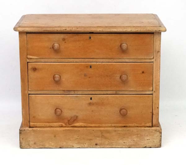 A 19thC pine chest of drawers comprising three graduated long drawers 35 1/2" wide x 19 3/4" deep x - Image 2 of 4