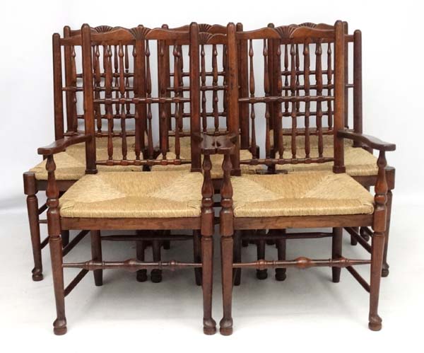 A set of 8 (6+2) oak spindle back chairs with envelope rush seats . - Image 3 of 6