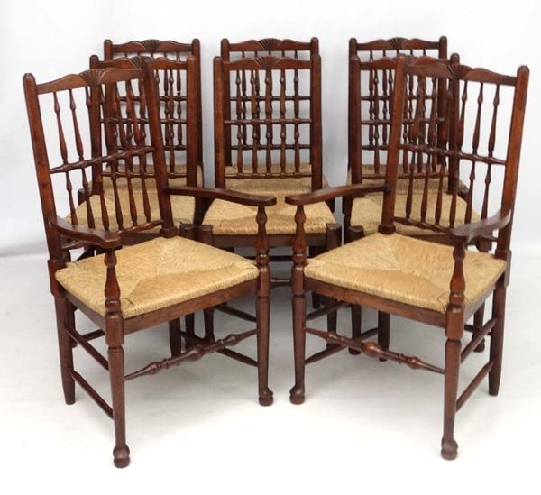 A set of 8 (6+2) oak spindle back chairs with envelope rush seats . - Image 6 of 6