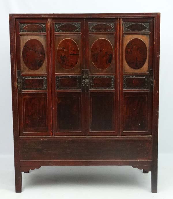 Chinese :a Chinese elm cabinet with painted and lacquered decoration the four doors opening to - Image 2 of 4