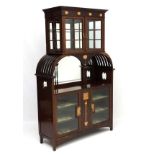 Art Nouveau : An inlaid mahogany cabinet with copper tulip wood and blonde wood inlay etc.