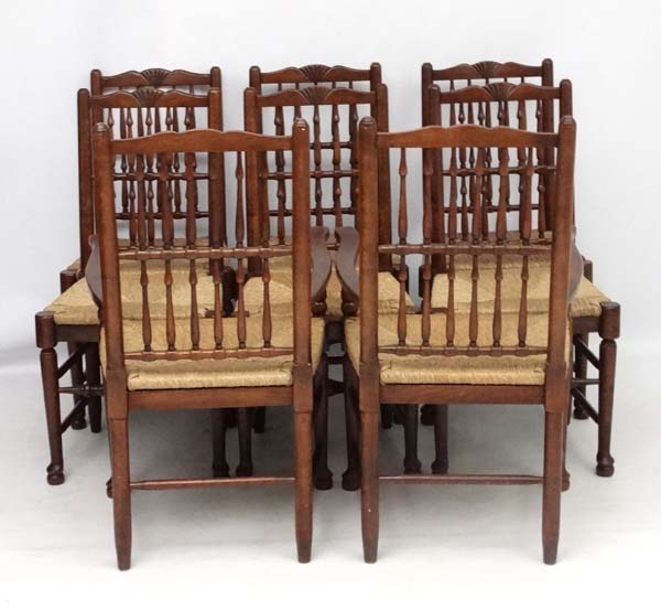 A set of 8 (6+2) oak spindle back chairs with envelope rush seats . - Image 2 of 6