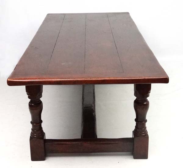 A large oak 4-plank dining table in the 17thC style Refectory table with baluster turned legs and - Image 4 of 7