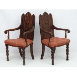 Arts and Crafts : A pair of 19thC Gothic Oak open armchairs ,