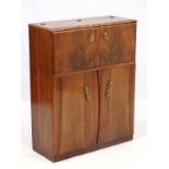 Art Deco : a 1930's walnut Cocktail Cabinet with fold down front revealing mirrored interior and