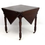 A late 19thC walnut drop flap table with triangular shaped drop flap sections 29 1/2" sq.