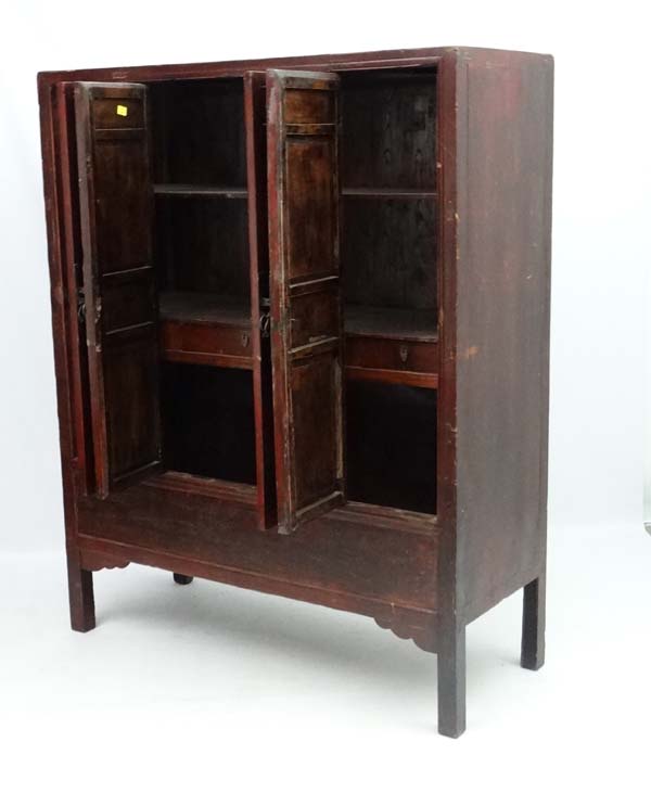 Chinese :a Chinese elm cabinet with painted and lacquered decoration the four doors opening to - Image 3 of 4