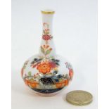 A miniature Meissen style bottle vase,