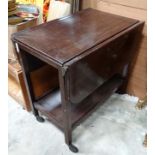 Mahogany tea trolley / table CONDITION: Please Note - we do not make reference to