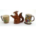 A Beswick teapot modelled as a red brown squirrel holding a nut, bears factory stamp to base.