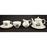 A 1954 and 1956 Royal Worcester fruit pattern bachelor tea set,