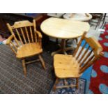 Folding tripod table and 2 pine chairs CONDITION: Please Note - we do not make