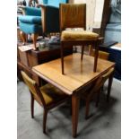 Retro draw left table and 4 matching chairs ( with spare upholstery fabric) CONDITION: