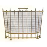 Edwardian fire guard : an Edwardian Brass spark guard with carry handle to top.