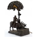 An early 20 thc Cast bronze lamp in the form of an ox watering ( at underllit glass watertrough )