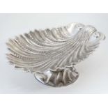 A silver plate tazza / pedestal bowl formed as a scallop shell 11 3/4" wide x 4" high