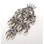 A Continental silver and white metal brooch,