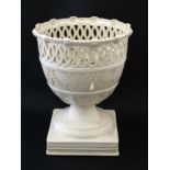 A Leedsware Classical Creamware pierced pedestal urn, bears impressed makers mark to base of basket.