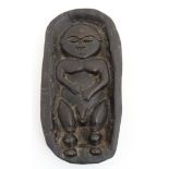 Ethnographic native tribal : A Polynesian carved wooden depiction of a baby in a cradle / basket