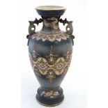 A Chinese two handled lavender blue pedestal vase,