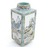 A Chinese Famille Rose porcelain cong / kong vase having turquoise glazed scrolling lotus ground