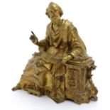 A 19thC gilded bronze figure 'Lois d' Athenes ' depicting a seated scholar leaning upon a pillar