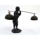 A c.1900 Japanese spelter figure carrying 2 bells.