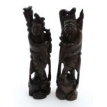 2 19thC carved wooden Chinese figures with white metal inlay one of Shai Lao.